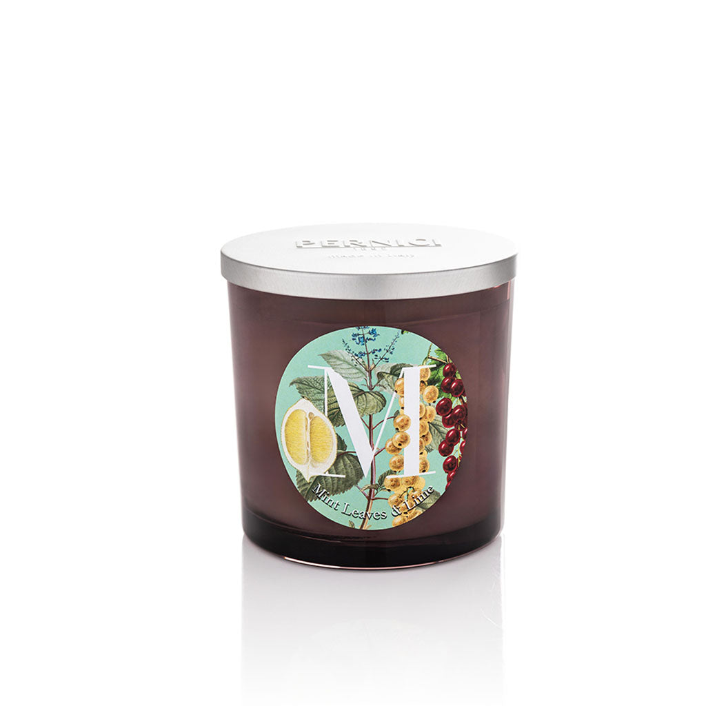 Candela profumata Elementi 350gr profumazione Mint leaves & Lime di Pernici in still life.